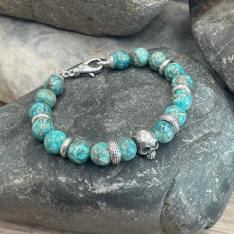 Bracelet homme DRAGON BONES – perles de turquoise sud-africaine 10 mm, tête de mort Pitch & Néo® et fermoir dragon argent 925