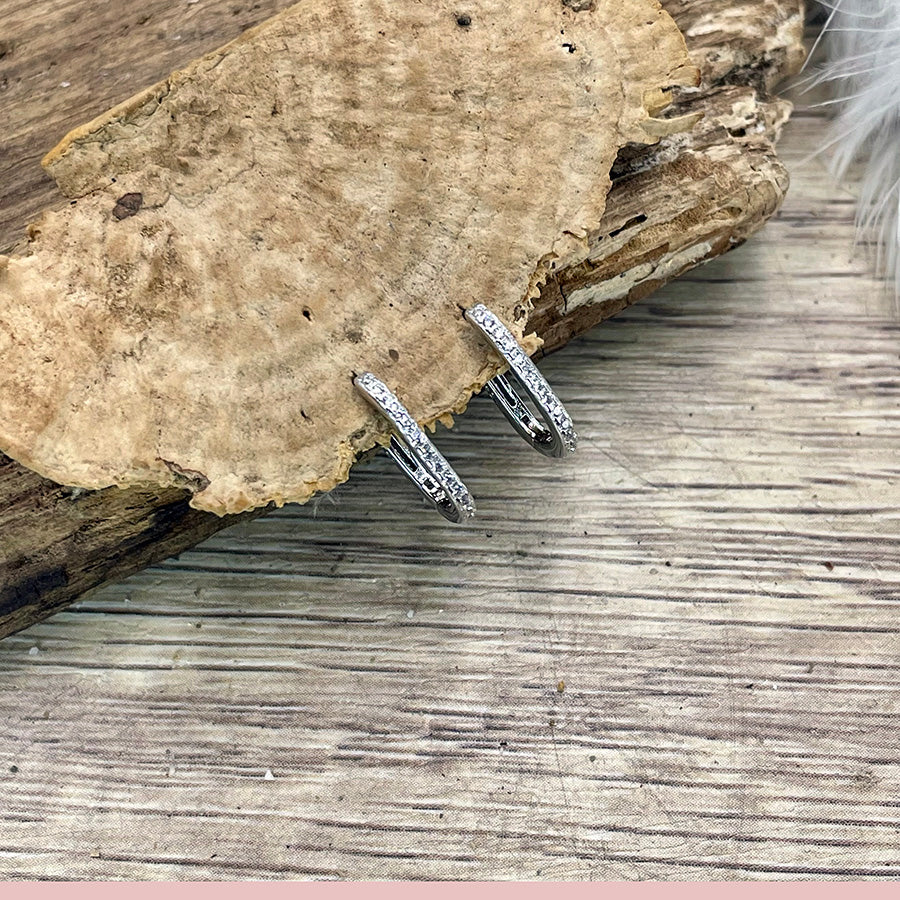 Boucles d’oreilles femme SHARP TALK – créoles ovales 15 mm pavées de zircons façon diamant et argent 925