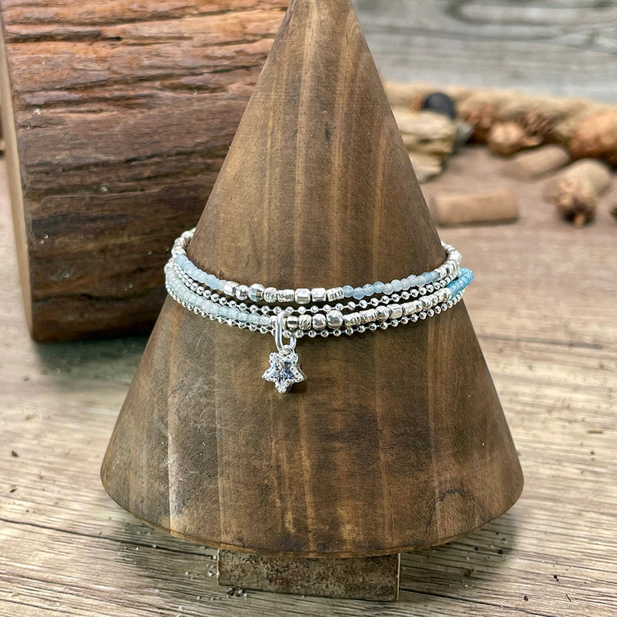 STELLA SCINTILLA BRACELET MULTI-RANGS EN PERLES D'AIGUE-MARINE À FACETTES AVEC PENDENTIF ZIRCON TAILLÉ EN ÉTOILE EN ARGENT 925