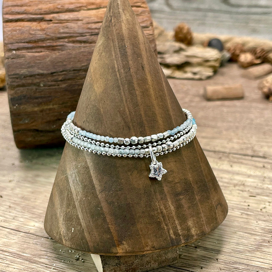 STELLA SCINTILLA BRACELET MULTI-RANGS EN PERLES D'AIGUE-MARINE À FACETTES AVEC PENDENTIF ZIRCON TAILLÉ EN ÉTOILE EN ARGENT 925