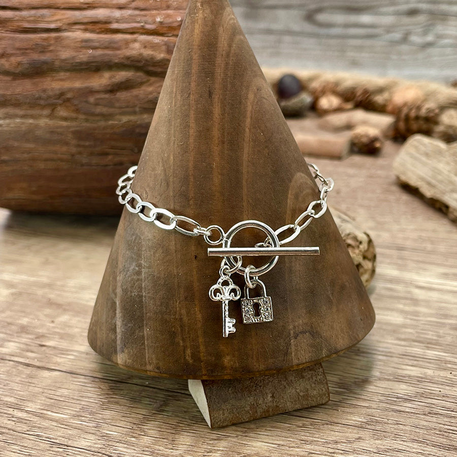 Bracelet femme HOLD-UP HONEY – chaîne ovale plate, fermoir toggle XL, pendentifs clé & cadenas pavé, argent 925