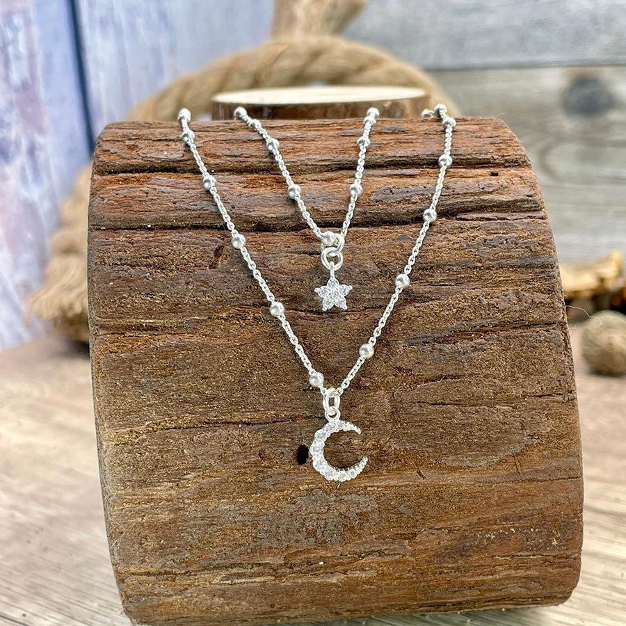 Collier femme SHINE LIKE A SIN – double rang lune et étoile pavées, zircons façon diamant, chaînes forçat perles alternées en argent 925