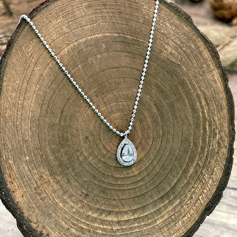 Collier femme TEARS OF A RICH B$TCH – chaîne boules facettées scintillantes, pendentif goutte zircon et argent 925