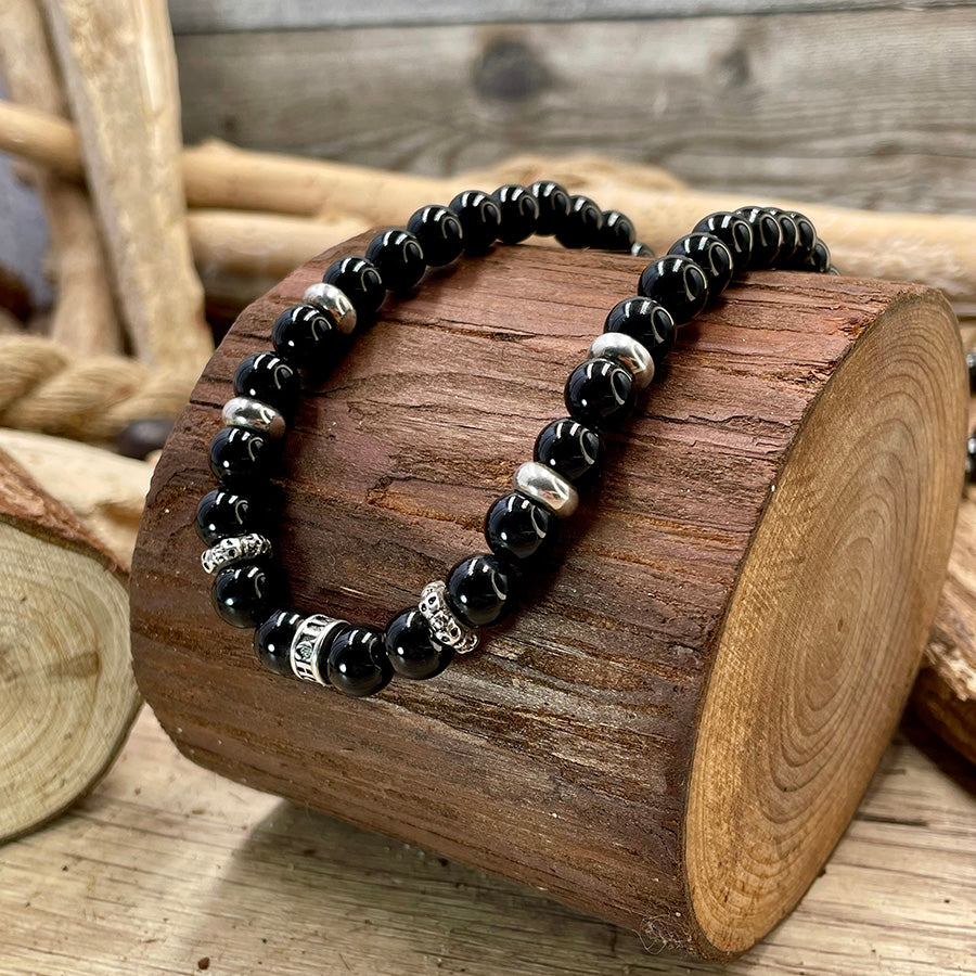 Collier homme BAD OMEN – perles d’onyx, donut logo gravé, skulls tête de mort et argent 925