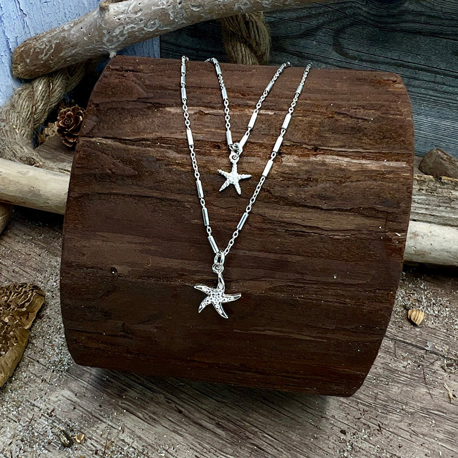 Collier femme double-rang GLITTER & SEA STARS ONLY – chaîne forçat tubes miroir et pendentifs étoiles de mer sertie et lisse en argent 925