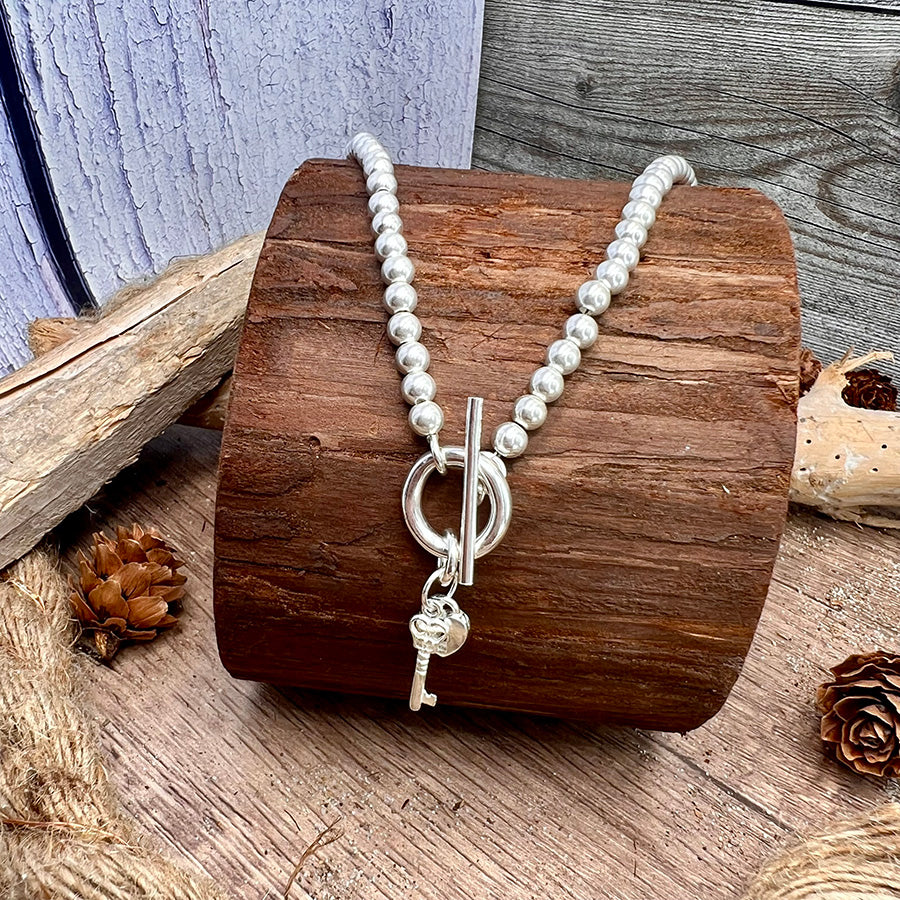 Collier femme LOVE? I KEEP THE KEY – perles boules 5 mm argent 925, fermoir toggle oversize et pendentifs cœur cadenas et clé