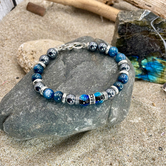 Bracelet homme GHOST FREQUENCY – perles de terahertz 10 mm, perles de cyanite, donut signature et fermoir mousqueton argent 925
