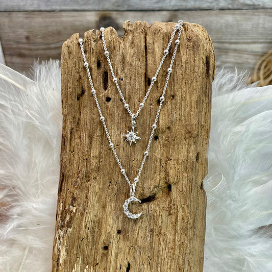 ECLIPSE DIAMOND COLLIER CHAÎNES BOULES DOUBLE RANG AVEC PENDENTIFS LUNE ET ÉTOILE DU NORD SERTIE DE ZIRCONS ET ARGENT 925