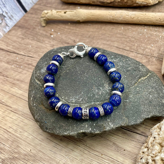 NEVERMIND MEN'S BRACELET IN LAPIS LAZULI BEADS AND SKULL SPACER IN 925 SILVER