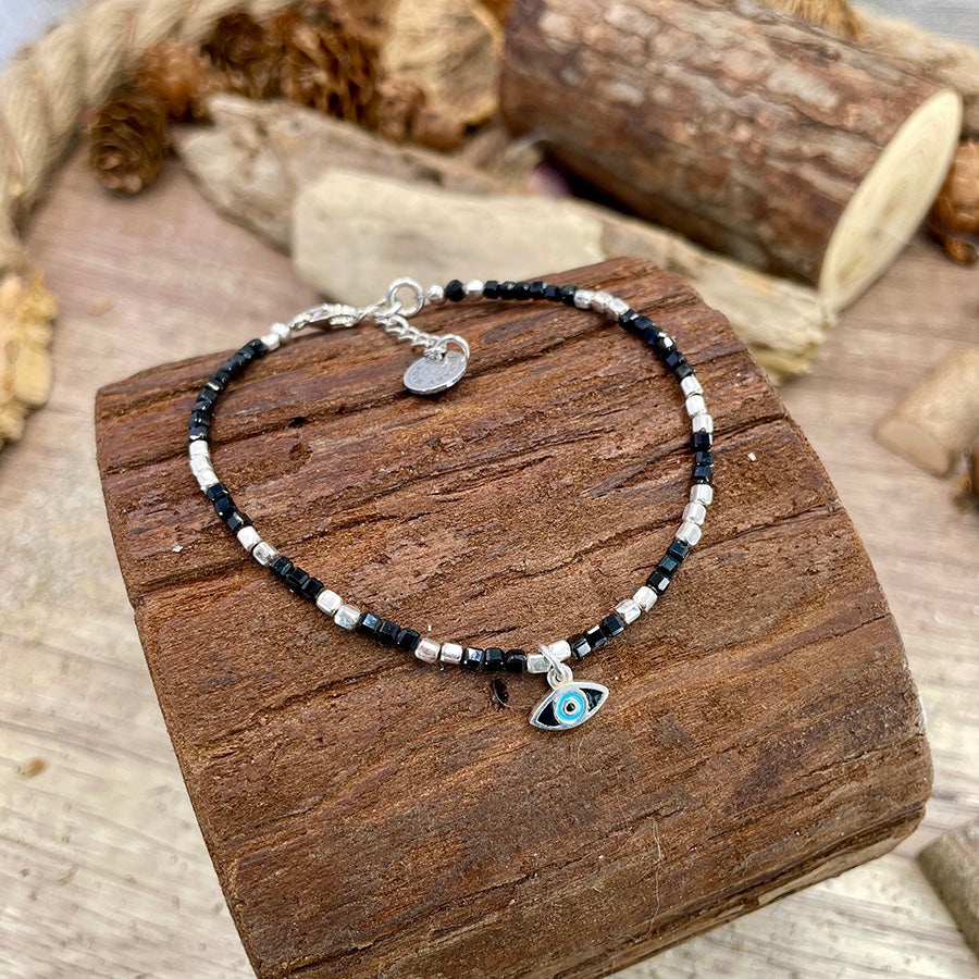 BLUE EYES BRACELET EN PERLES DE SPINELLE CARRÉES AVEC ŒIL PROTECTEUR EN ÉMAIL ET ARGENT 925