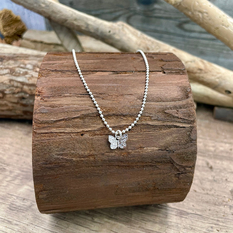 Collier femme TOO CUTE TO BE PURE, LOVER! – chaîne boules facettées scintillantes en argent 925, pendentif papillon pavé façon diamant.