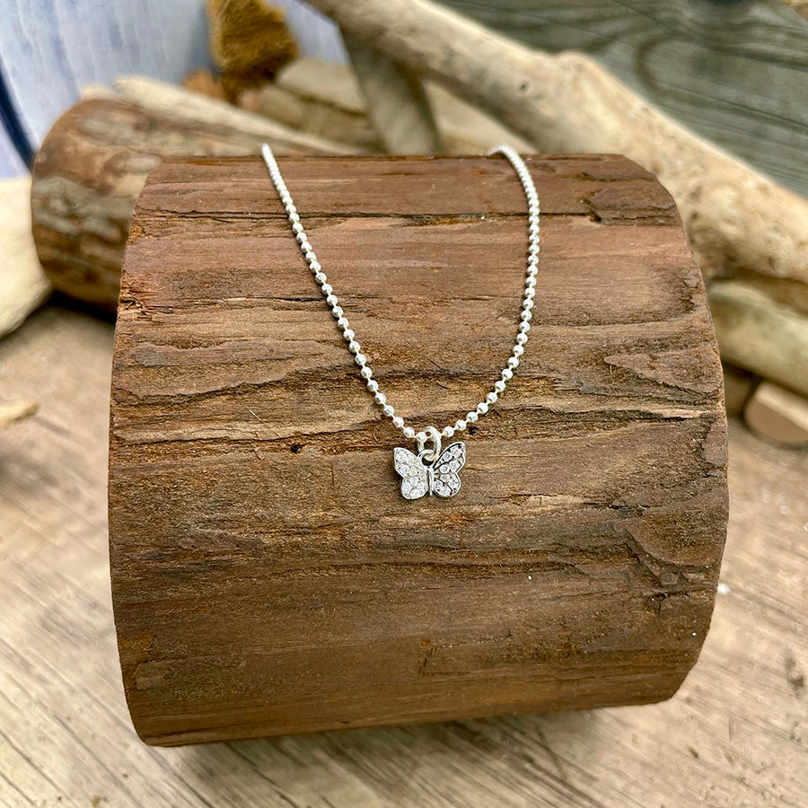Collier femme TOO CUTE TO BE PURE, LOVER! – chaîne boules facettées scintillantes en argent 925, pendentif papillon pavé façon diamant.
