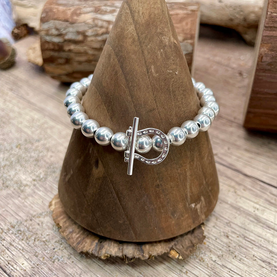 Bracelet femme LUCK YOU, DUDE – perles argent 925 7 mm & fermoir fer à cheval stylisé