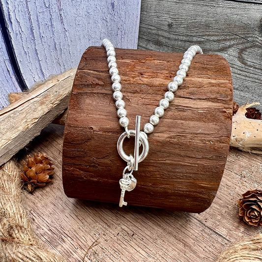 Collier femme LOVE? I KEEP THE KEY – perles boules 5 mm argent 925, fermoir toggle oversize et pendentifs cœur cadenas et clé