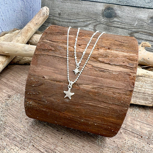 Collier femme double rang BEACH ME TO THE STARS – perles émaillées blanches, pendentif étoile de mer, étoile du Nord zircons, argent 925