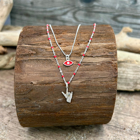 Collier femme double rang BAD LUCK? BLOCKED. – pendentif œil rouge émaillé et pendentif main corna pavée de zircons, chaîne perles émaillées rouges et maille boules facettées scintillantes en argent 925