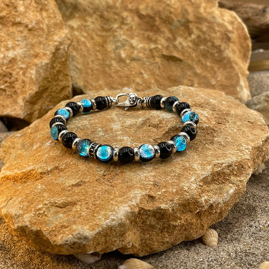 Bracelet homme BORN TO FREEZE U – perles d’onyx 8 mm, donut signature, fermoir skull et argent 925