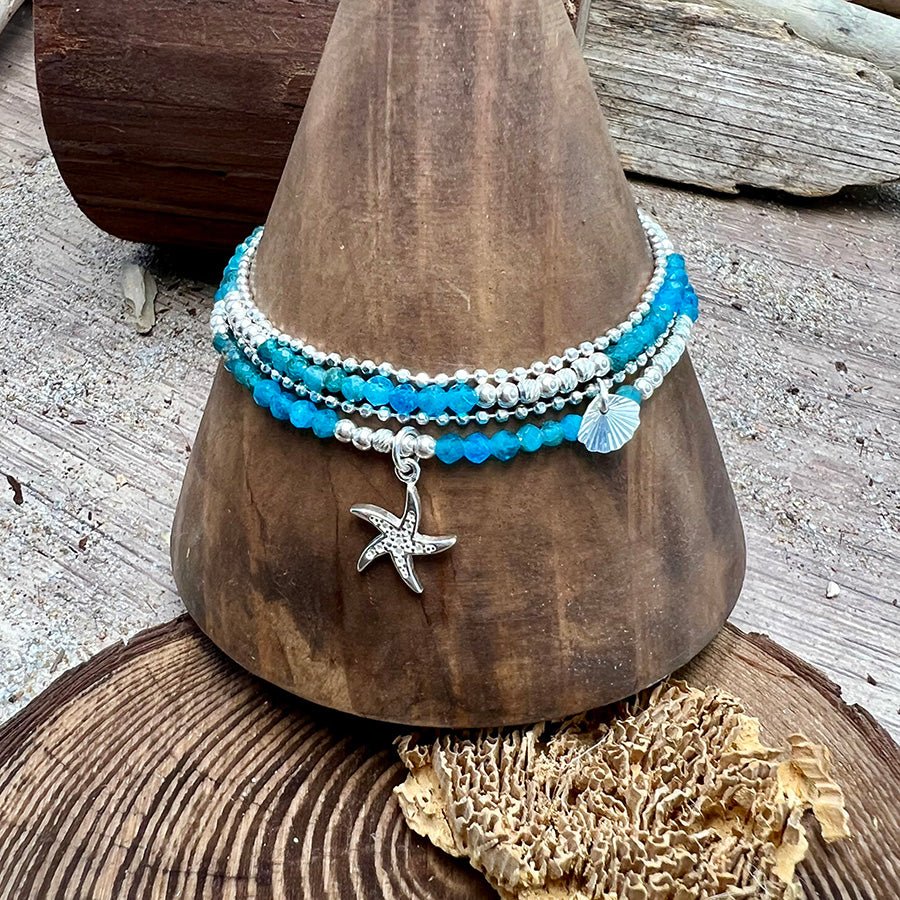 Bracelet femme multi - rang SEA IT AND CRY, BABY – perles d’apatite facettées, pendentif étoile de mer et argent 925 – bijoux fait main en argent 925 | Pitch & Néo