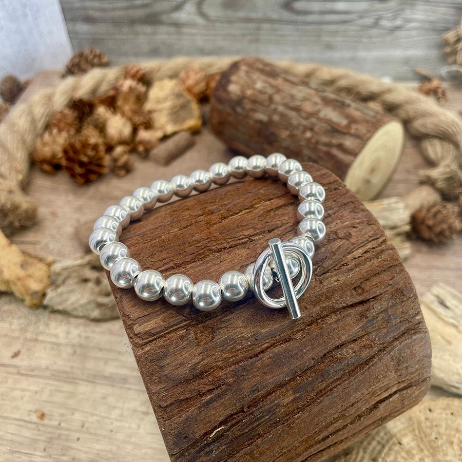 Bracelet femme TOGGLE ICON – perles en argent 925 et fermoir toggle central sur élastique – bijoux fait main en argent 925 | Pitch & Néo