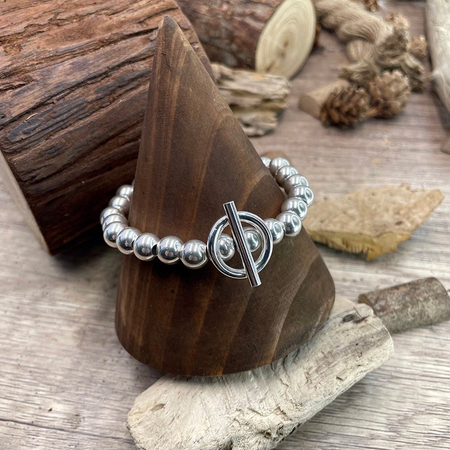 Bracelet femme TOGGLE ICON – perles en argent 925 et fermoir toggle central sur élastique – bijoux fait main en argent 925 | Pitch & Néo