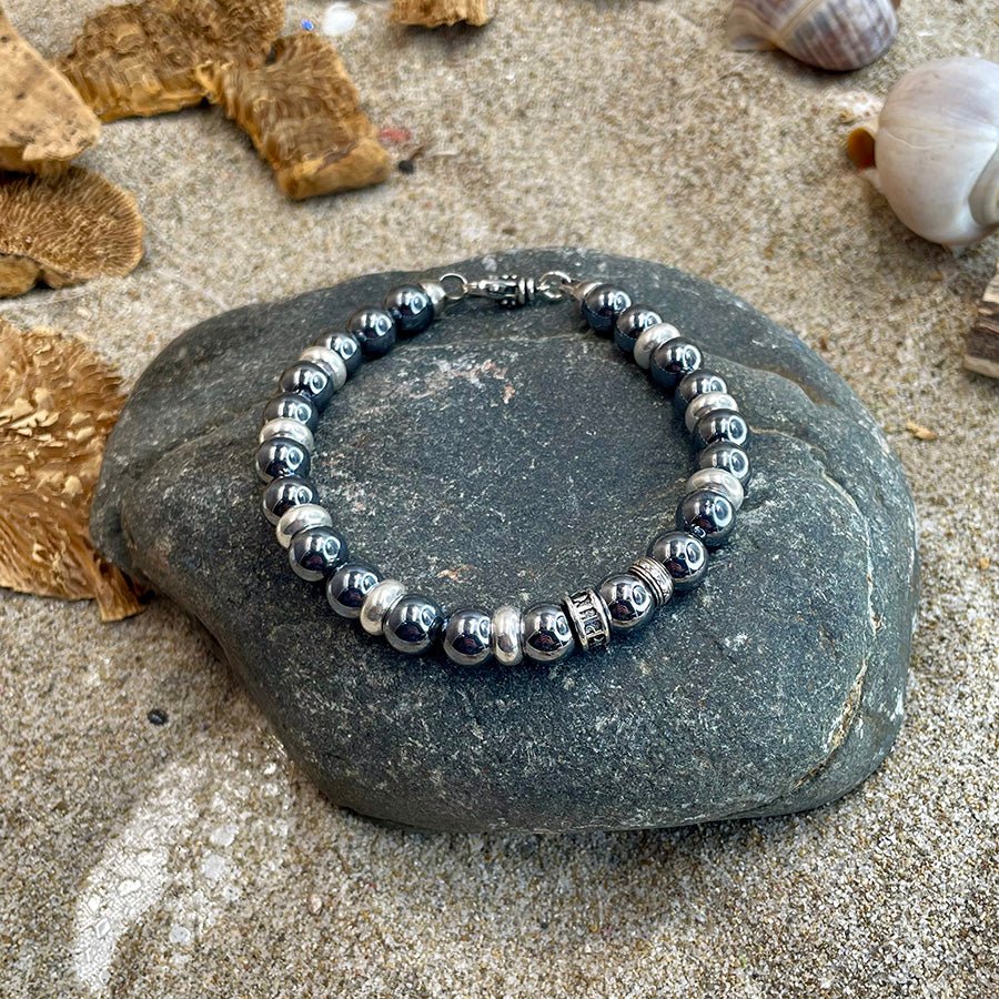 Bracelet homme NUCLEAR KISS – perles de térahertz du Japon 8 mm, donut signature, fermoir mousqueton et argent 925 – bijoux fait main en argent 925 | Pitch & Néo