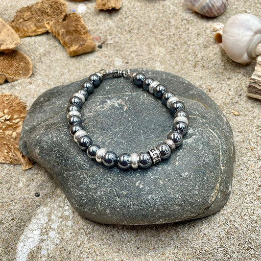 Bracelet homme NUCLEAR KISS – perles de térahertz du Japon 8 mm, donut signature, fermoir mousqueton et argent 925 – bijoux fait main en argent 925 | Pitch & Néo