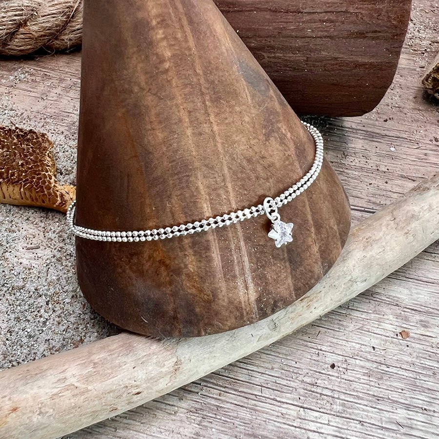 Chaîne de cheville femme STARSTRUCK BABY – double rang chaîne boules facettées scintillantes argent 925 et pendentif étoile zircon – bijoux fait main en argent 925 | Pitch & Néo