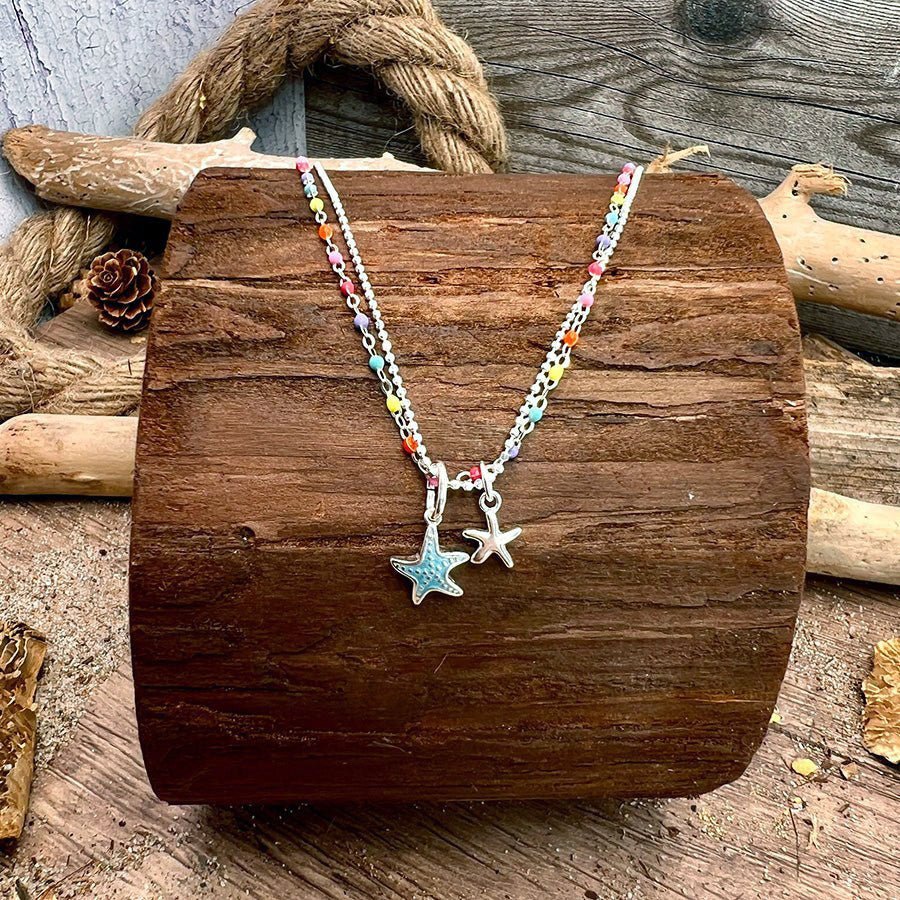 Collier double rang chaîne perles émaillées fluo multicolore et chaîne boules facettées scintillantes pendentifs étoiles de mer miroir et émail turquoise femme argent 925 STARFISH & REPEAT – bijoux fait main en argent 925 | Pitch & Néo