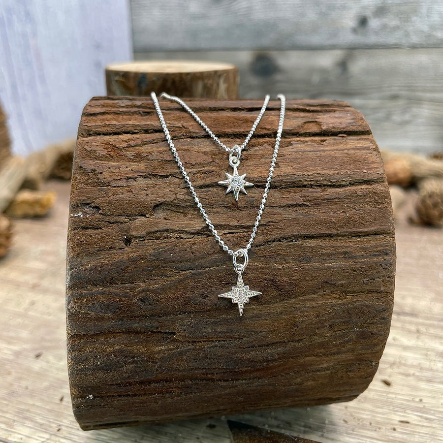 Collier femme double - rang BORN TO SHINE DARLING – chaînes boules facettées scintillantes & pendentifs étoiles polaires zircons façon diamant en argent 925 – bijoux fait main en argent 925 | Pitch & Néo