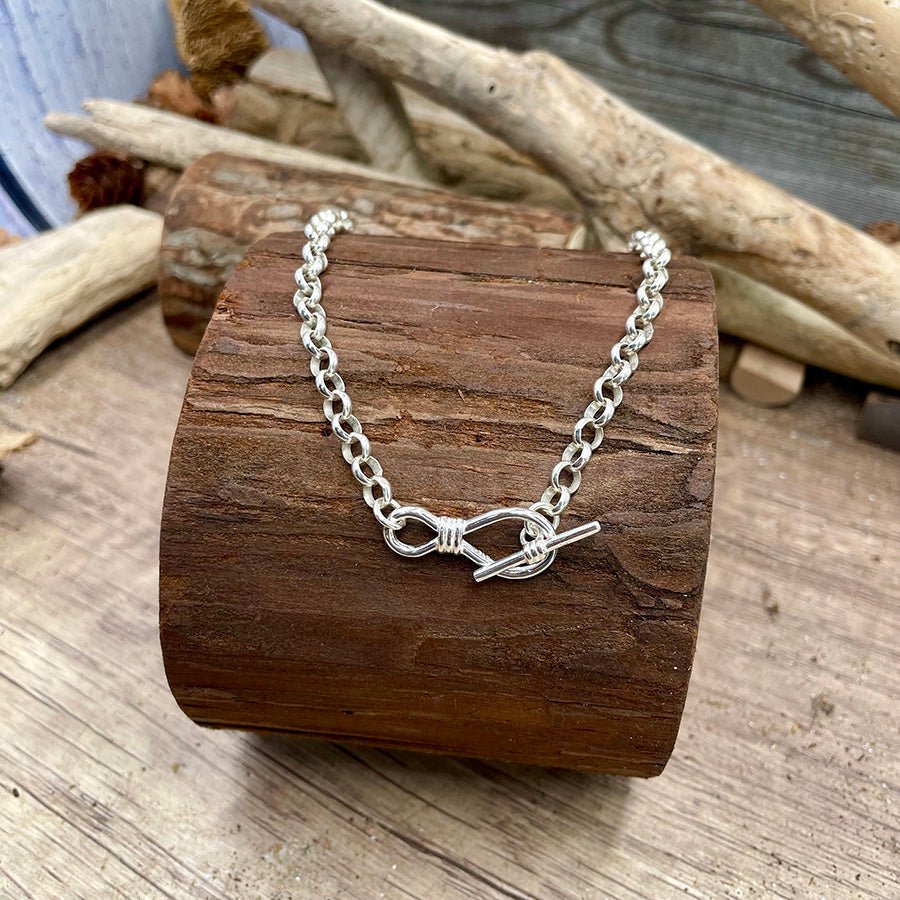 Collier femme ENDLESSLY UNTOUCHABLE, DEAR – chaîne jaseron épaisse & fermoir toggle nœud infini stylisé en argent 925 – bijoux fait main en argent 925 | Pitch & Néo