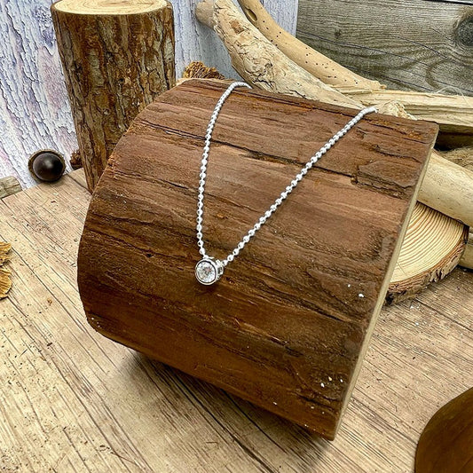 Collier femme GLOW OR GO HOME – chaîne boules facettées scintillantes & pendentif zircon façon diamant 7 mm serti clos en argent 925 – bijoux fait main en argent 925 | Pitch & Néo