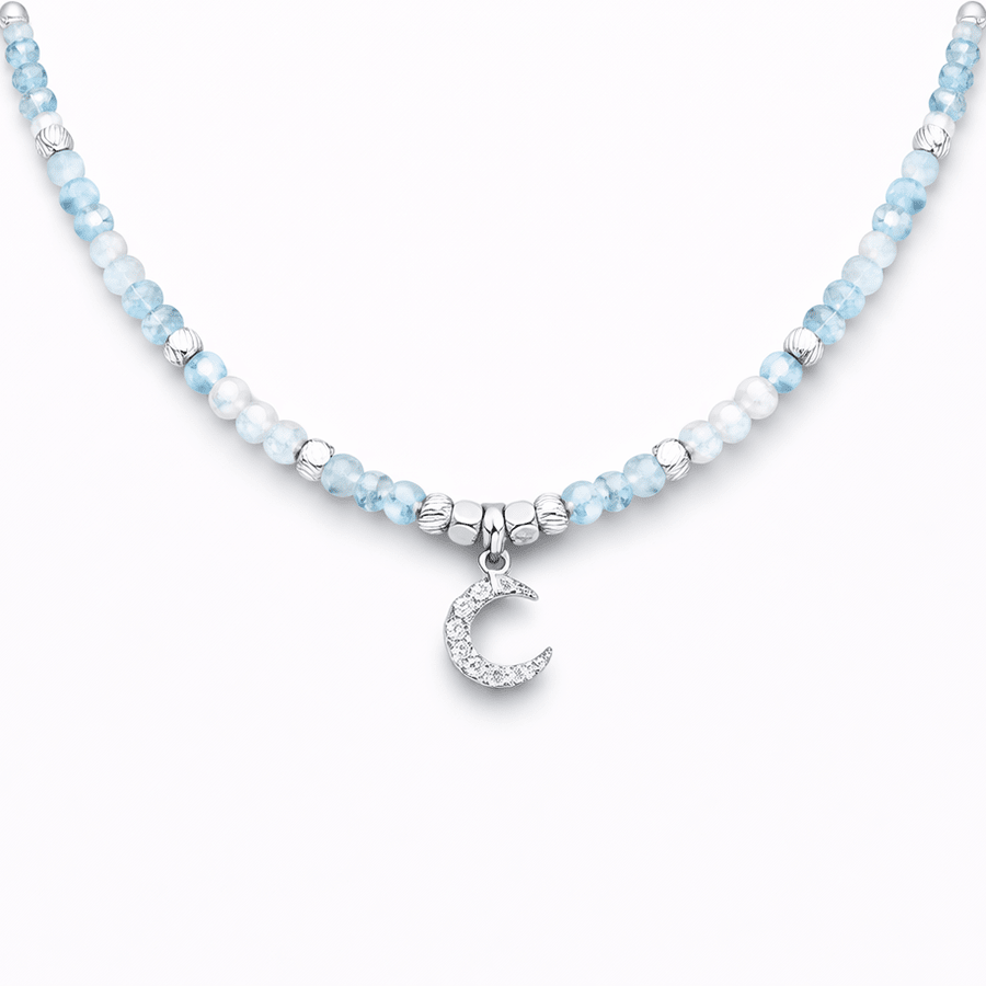 Collier femme SEND ME TO THE MOON, BUT FIRST CHAMPAGNE! – perles d’aigue - marine facettées, pendentif lune zircons façon diamant et argent 925 – bijoux fait main en argent 925 | Pitch & Néo
